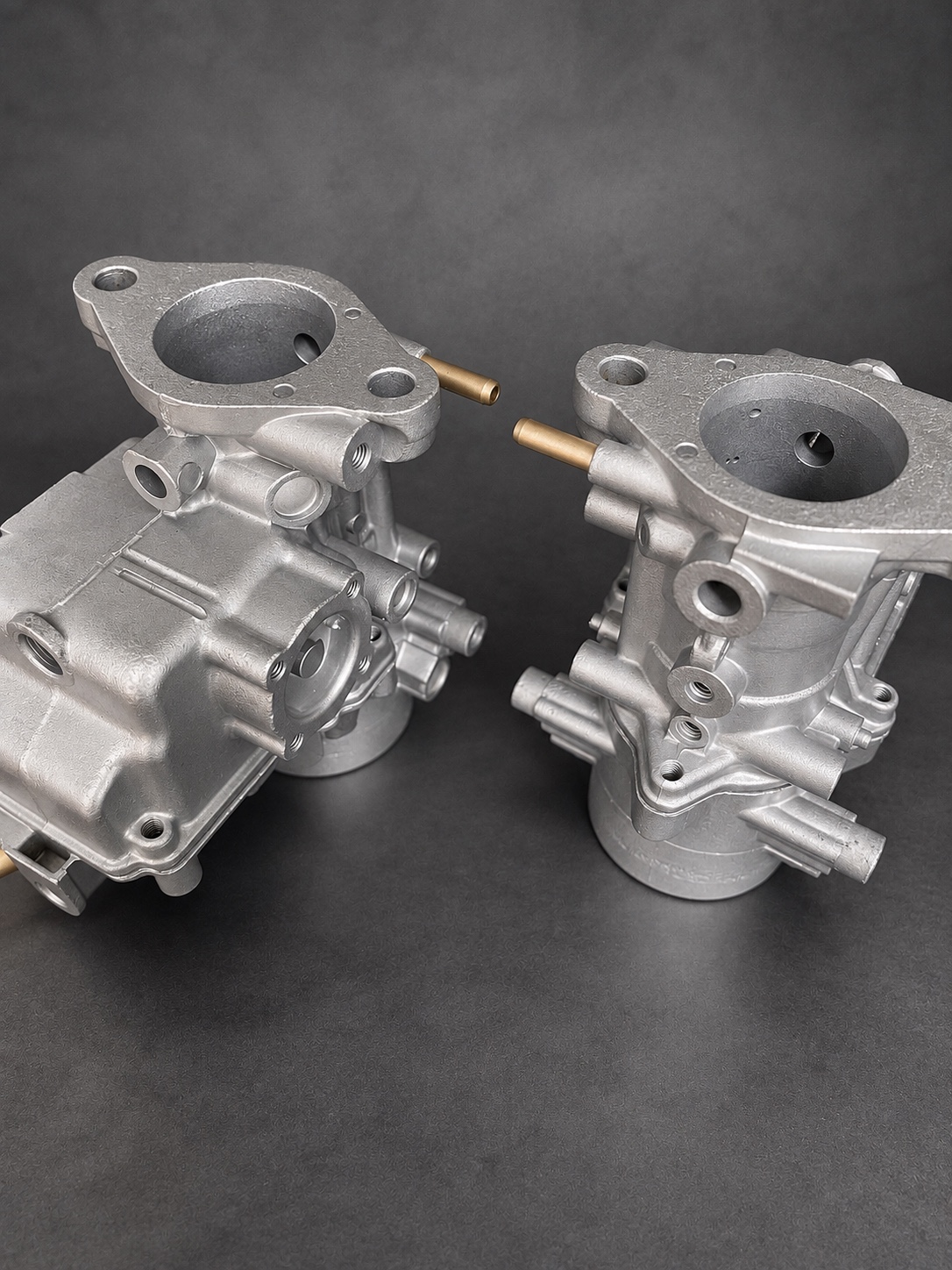 Overhead detail of vapour-blasted carburettor bodies and flange bores